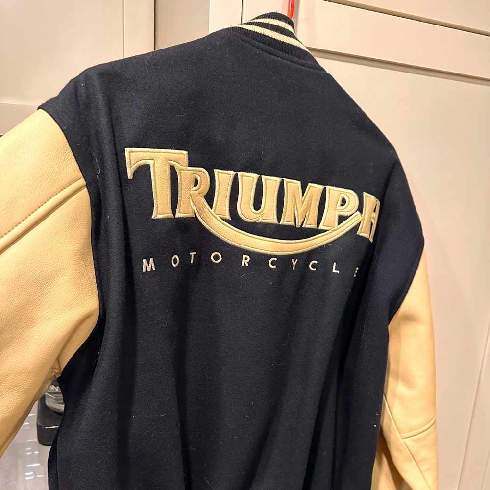Officially licensed leather sleeved, Triumph motorcycle riding Jacket.